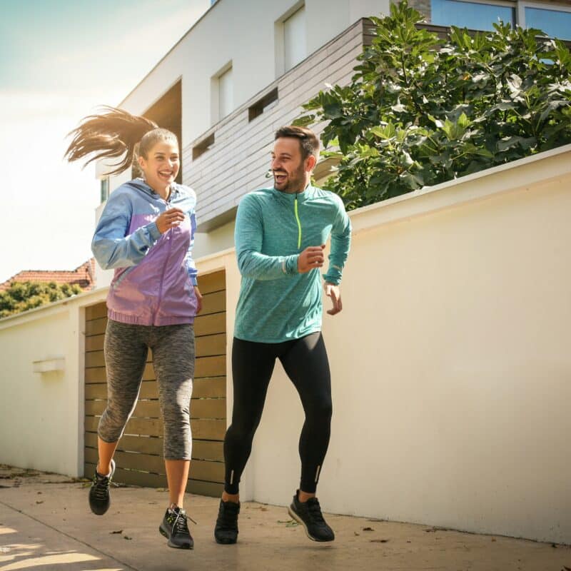 Man en vrouw samen hardlopen - RunX